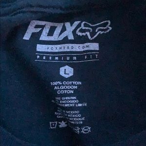 A blue fox tee shirt